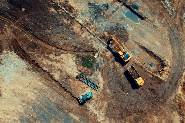 Top view of a constuction site with trucks